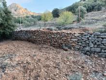 Ares invierte 10.000 euros en la reparación de los muros de piedra en seco del Barranc dels Molins
